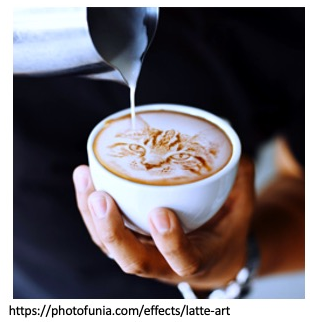 A generated artwork from photofunia.com with a tabby cat as latte art on a cup of coffee being poured